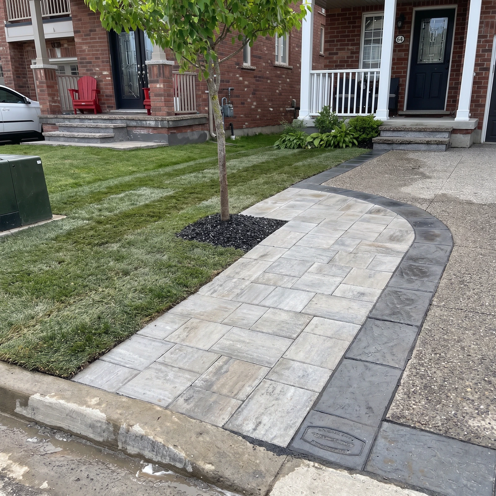 Curved front walkway and sod